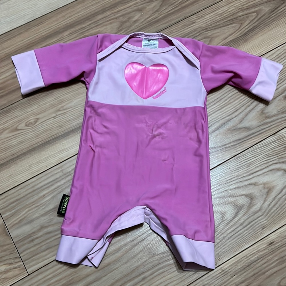 Baby copper tone swim suit size 0-12months.